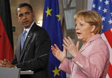 President Barack Obama and German Chancellor Angela Merkel hold a joint news conference at the Baden-Baden City Hall.