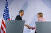 President Barack Obama and German Chancellor Angela Merkel hold a joint news conference at the Baden-Baden City Hall.