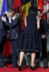 President Barack Obama embraces Chancellor Merkel at the Kurhaus in Baden-Baden, Germany.