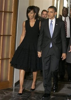 President Barack Obama and First Lady Michelle Obama attend a piano concert at the Kurhaus in Baden-Baden, Germany.