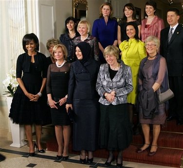 After the piano concert in the Kurhaus, First Lady Michelle Obama and the other G20 leader's spouses leave for a group photo.