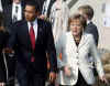 President Barack Obama and the NATO leaders walk in a ceremonial crossing of the Passarelle Mimram (Two Banks) Pedestrian Bridge from Kehl, Germany to Strasbourg, France on April 4, 2009.