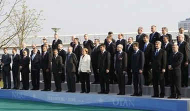 President Barack Obama and the NATO leaders assemble for a group photo prior to a NATO ceremony in Strasbourg, France.