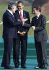 US President Barack Obama talks with French President Sarkozy and UK PM Brown at the NATO Summit in Strasbourg, France on April 4, 2009.