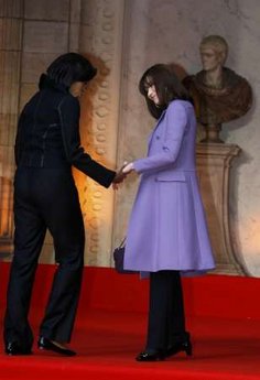 First Lady Michelle Obama meets First Lady Carla Bruni-Sarkozy and the spouses of other G20 leaders for a tour of Notre-dame de Strasbourg (Strasbourg Cathedral) on April 4, 2009.