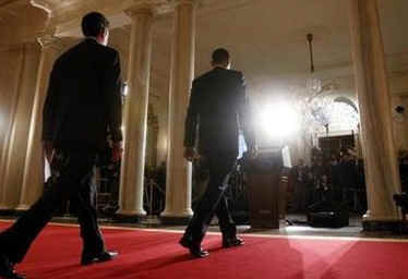 President Barack Obama, US Treasury Secretary Timothy Geithner, and Internal Revenue Service (IRS) Commissioner Doug Shulman arrive to remark on tax reform in the Grand Foyer of the White House on May 4, 2009.