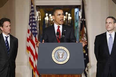 President Barack Obama, US Treasury Secretary Timothy Geithner, and Internal Revenue Service (IRS) Commissioner Doug Shulman remark on tax reform in the Grand Foyer of the White House on May 4, 2009.