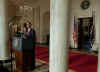President Barack Obama, US Treasury Secretary Timothy Geithner, and Internal Revenue Service (IRS) Commissioner Doug Shulman remark on tax reform in the Grand Foyer of the White House on May 4, 2009.