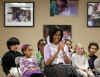 First Lady Michelle Obama celebrates Cinco de Mayo, an Hispanic heritage event, in a celebration with students at Lamb Public Charter School in Washington on May 4, 2009.