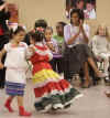 First Lady Michelle Obama celebrates Cinco de Mayo, an Hispanic heritage event, in a celebration with students at Lamb Public Charter School in Washington on May 4, 2009.