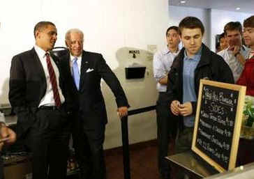 President Barack Obama and Vice President Joe Biden read the menu at Ray's Hell Burger across the Potomac in Arlington, Virginia.