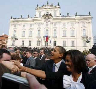 The US President and First Lady greet the crowd after Obama's speech.
