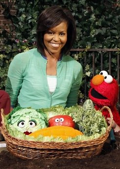 First Lady Michelle Obama taped a public service announcement on the set of Sesame Street to promote Healthy Habits For Life.
