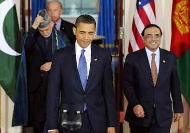 US President Barack Obama arrives for remarks to the media with Afghanistan's President Hamid Karzai and Pakistan's President Asif Ali Zardari.