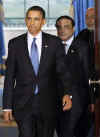 US President Barack Obama arrives for remarks to the media with Afghanistan's President Hamid Karzai and Pakistan's President Asif Ali Zardari.