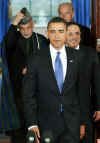 US President Barack Obama arrives for remarks to the media with Afghanistan's President Hamid Karzai and Pakistan's President Asif Ali Zardari.