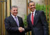 President Obama was led into the Turkish Parliament by Speaker Koksal Toptan. 