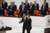 President Obama was led into the Turkish Parliament by Speaker Koksal Toptan. 