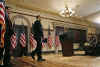 President Barack Obama arrives to deliver remarks on reducing spending in the budget with Budget Director Peter Orzag and Deputy Budget Director Robert Nabors.