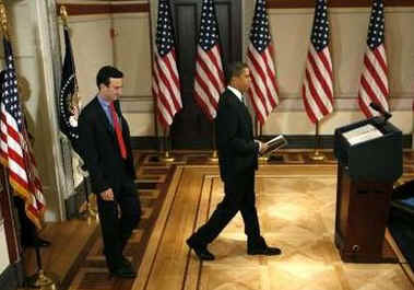 President Barack Obama arrives to deliver remarks on reducing spending in the budget with Budget Director Peter Orzag.