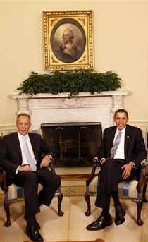 President Barack Obama, Secretary of State Hillary Clinton, and National Security Advisor James Jones talk to the media after meeting with Russian Foreign Minister Sergey Lavrov in the Oval Office of the White House on May 7, 2009.