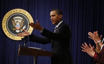 President Barack Obama makes an unannounced visit to a Spanish language Town Hall meeting in the Eisenhower Executive Office Building on May 8, 2009.