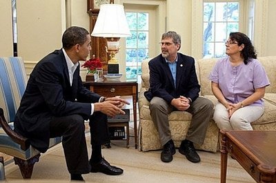 President Obama meets with Captain Richard Phillips and his wife Andrea in the oval Office of the White House.