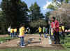 First Lady Michelle Obama tends to her White House Kitchen Garden with help from students of Bancroft Elementary School.
