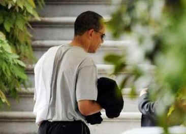 President Barack Obama returns to the White House after a private basketball excursion on May 9, 2009.