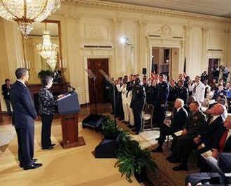 President Barack Obama and Homeland Security Secretary Janet Napolitano attend a naturalization ceremony.