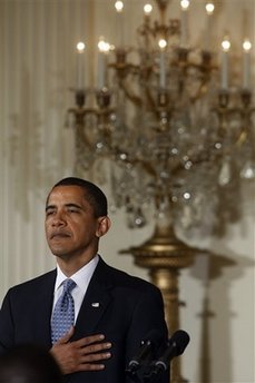 President Barack Obama and Homeland Security Secretary Janet Napolitano attend a naturalization ceremony.