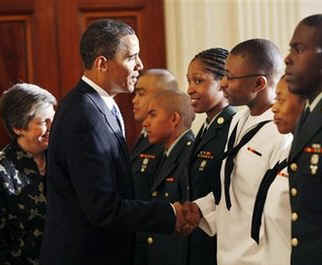 President Barack Obama and Homeland Security Secretary Janet Napolitano attend a naturalization ceremony.