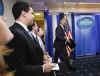 President Barack Obama interrupts the press briefing by Press Secretary Robert Gibbs in the Brady Press Briefing Room.