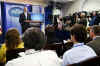 President Barack Obama interrupts the press briefing by Press Secretary Robert Gibbs in the Brady Press Briefing Room.