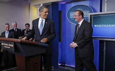 President Barack Obama interrupts the press briefing by Press Secretary Robert Gibbs in the Brady Press Briefing Room.