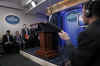 President Barack Obama interrupts the press briefing by Press Secretary Robert Gibbs in the Brady Press Briefing Room.