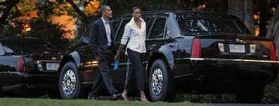 President Barack Obama and First Lady Michelle Obama return to the White House in the presidential limo.
