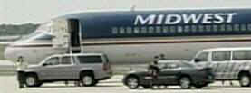 On July 7 (7/7), 2008 Obama’s campaign plane declares an emergency and is re-routed from Chicago (7 letters) and diverted to St. Louis (7 letters). The original destination of Barack Obama's 7/7 plane was Charlotte, NC. Photo: Barack Obama's plane sits on the tarmac at St. Louis after diverting from Chicago to Charlotte on 7/7 2008.