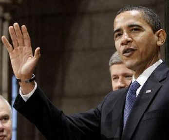 President Barack Obama says goodbye after a joint news conference on Parliament Hill with Canadian PM Stephen Harper.