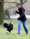 Malia Obama runs with Bo on the South Lawn of the White House on Bo's first day in his new home.
