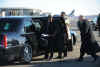 President-elect Barack Obama drops his Blackberry on the airport tarmac while getting out of his limousine on January 16, 2009. A Secret Service agent retrieves the dropped Blackberry and hands it Obama. The Secret Service advised Obama to seek an alternative to his Blackberry for security reasons, however Obama's Blackberry device was re-designed for security and President Obama was able to keep his treasured Blackberry.