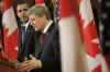 President Barack Obama and Prime Minister Stephen Harper hold a news conference on Parliament Hill after private meetings.