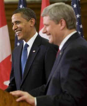 President Barack Obama and Prime Minister Stephen Harper hold a news conference on Parliament Hill after private meetings.