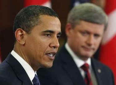 President Barack Obama and Prime Minister Stephen Harper hold a news conference on Parliament Hill after private meetings.