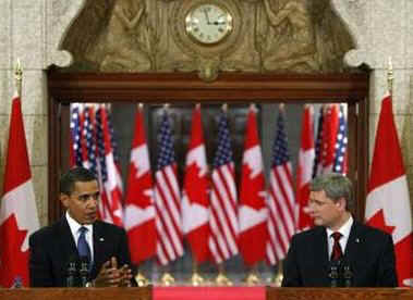 President Barack Obama and Prime Minister Stephen Harper hold a news conference on Parliament Hill after private meetings.