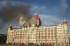 Many Mumbai targets (Taj Mahal Hotel ablaze) were struck and the attacks that lasted several day and killed over 150.
