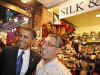 President Barack Obama's motorcade makes an unscheduled stop at an Ottawa market. President Obama purchases Ottawa key rings from a novelty store at market near the US Embassy in Ottawa.