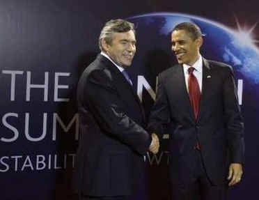 President Barack Obama arrives at the Excel Centre in London and is greeted by the UK PM Gordon Brown the host of the 009 London G20 Summit on April 2, 2009.
