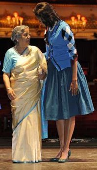 Michelle Obama with the wife of India's Prime Minister Singh. First Lady Michelle Obama joins Sarah Brown, the wife of UK PM Brown, and other spouses of G20 leaders at a special performance of Giselle at the Royal Opera House in London on April 2, 2009.